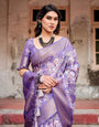 Elegant Purple Banarasi Silk Saree with Floral Weave, Zari Border, and Tassels