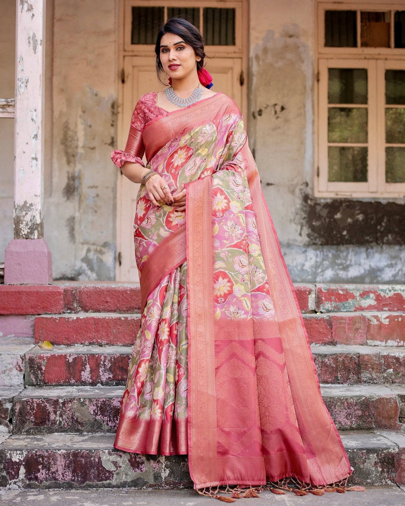 Graceful Peach and Pink Banarasi Silk Saree with Zari Weave and Tassels