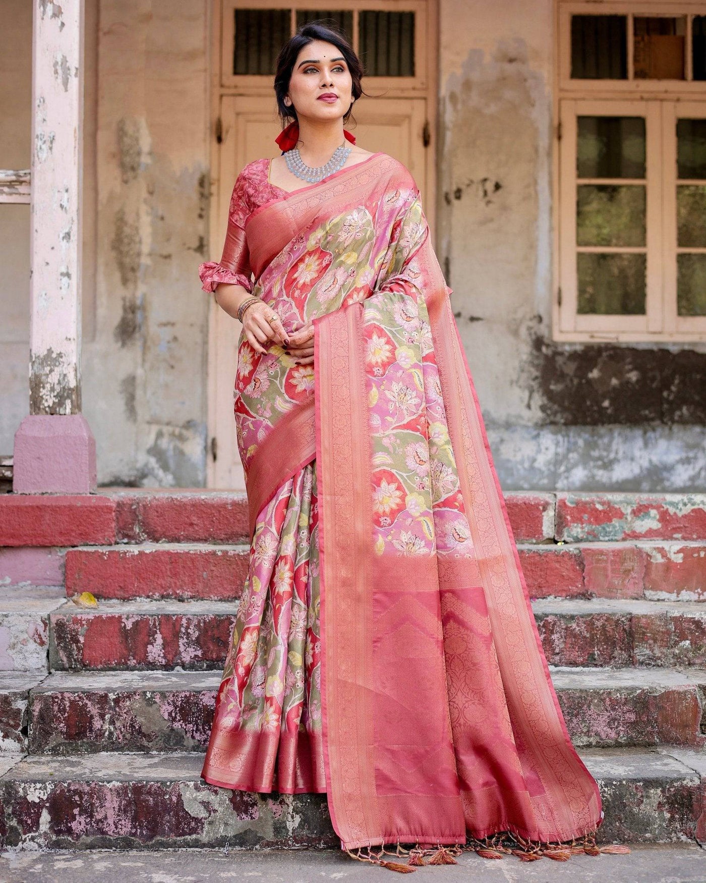 Graceful Peach and Pink Banarasi Silk Saree with Zari Weave and Tassels