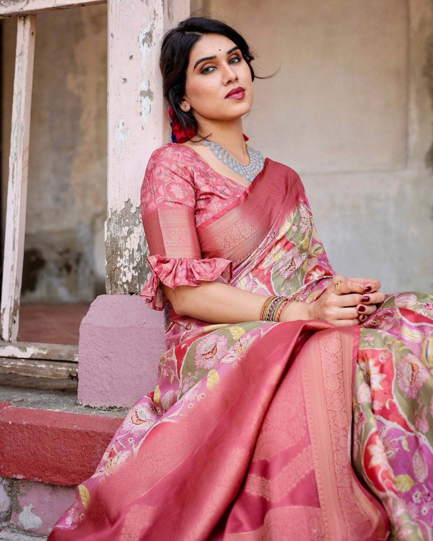 Graceful Peach and Pink Banarasi Silk Saree with Zari Weave and Tassels