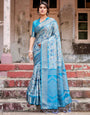 Aqua Blue Banarasi Silk Saree with Zari Border, Floral Motifs, and Tassels