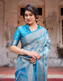 Aqua Blue Banarasi Silk Saree with Zari Border, Floral Motifs, and Tassels