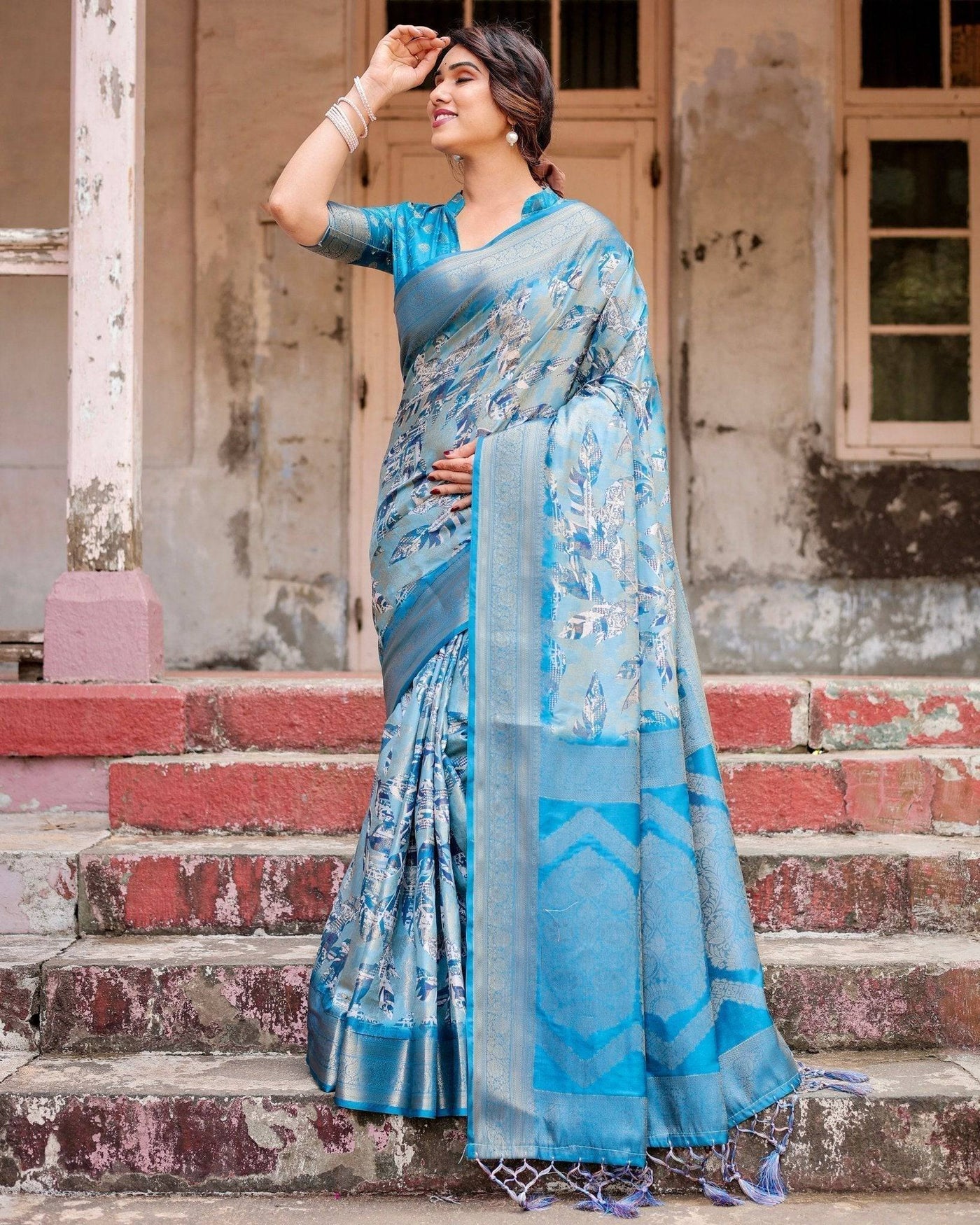 Aqua Blue Banarasi Silk Saree with Zari Border, Floral Motifs, and Tassels