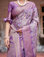 Lavender Banarasi Silk Saree with Intricate Zari Weaving, Tassel Accents, and Designer Floral Pallu