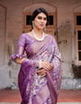 Lavender Banarasi Silk Saree with Intricate Zari Weaving, Tassel Accents, and Designer Floral Pallu