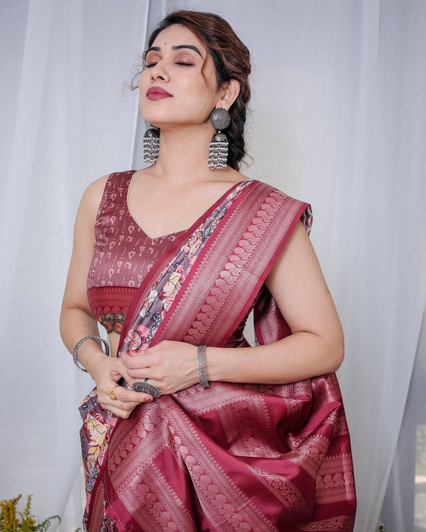 Luxurious Maroon Banarasi Silk Saree with Paisley Print and Tassels