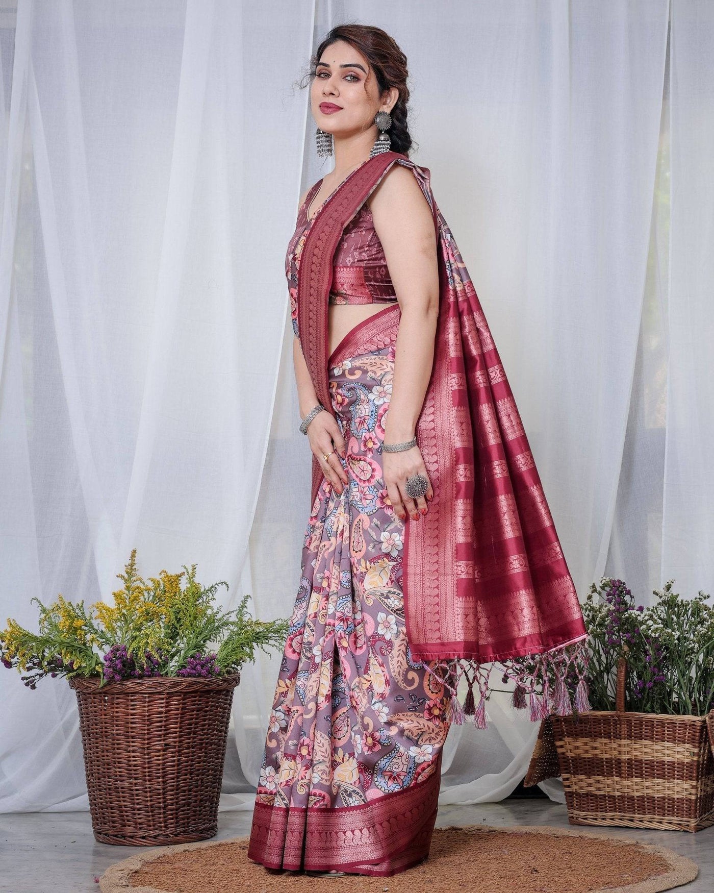 Luxurious Maroon Banarasi Silk Saree with Paisley Print and Tassels