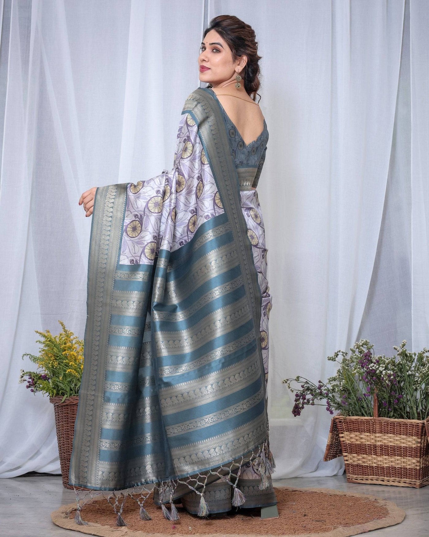 Graceful Banarasi Digitally Printed Silk Saree in Silver and Teal with Zari Work and Tassels