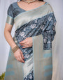 Timeless Blue and Silver Banarasi Silk Saree with Floral Design and Tassels