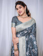 Timeless Blue and Silver Banarasi Silk Saree with Floral Design and Tassels