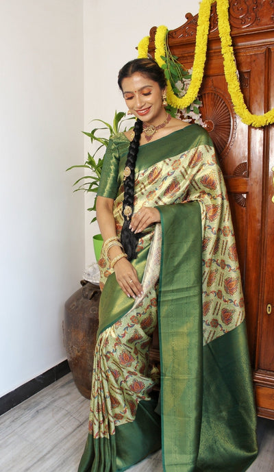 Digitally Printed Kuber Pattu Silk Saree, Exuding Regal Charm With Its Rich Pallu And Intricate Brocade Blouse, Elegantly Adorned With Enchanting Tassels On The Saree's Edge. - Almaari Fashion