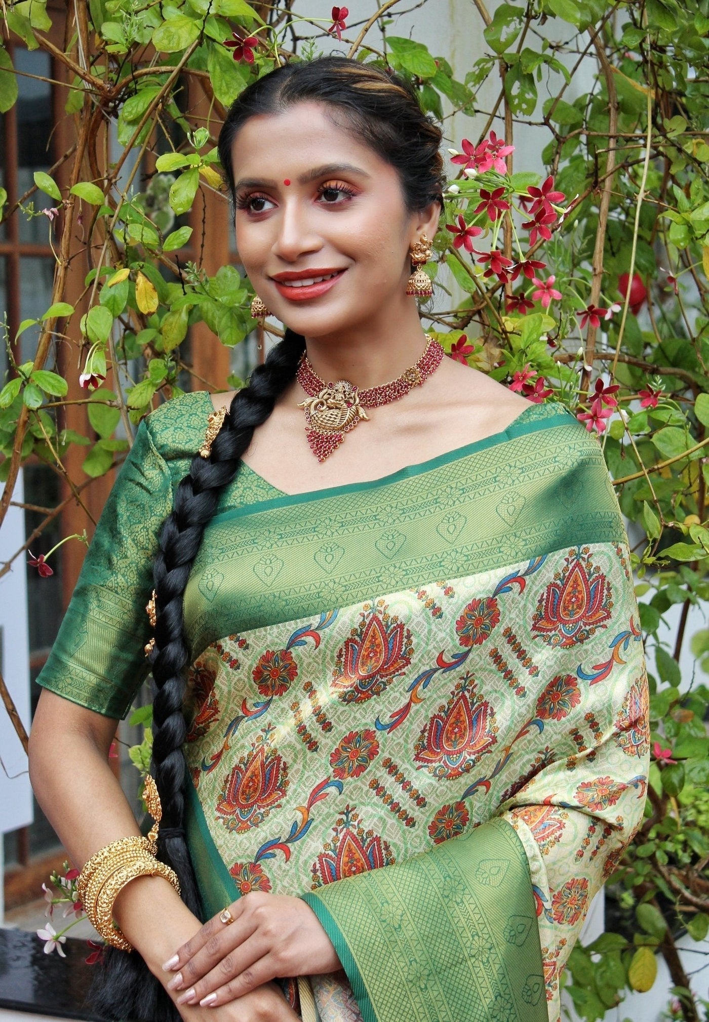 Digitally Printed Kuber Pattu Silk Saree, Exuding Regal Charm With Its Rich Pallu And Intricate Brocade Blouse, Elegantly Adorned With Enchanting Tassels On The Saree's Edge. - Almaari Fashion