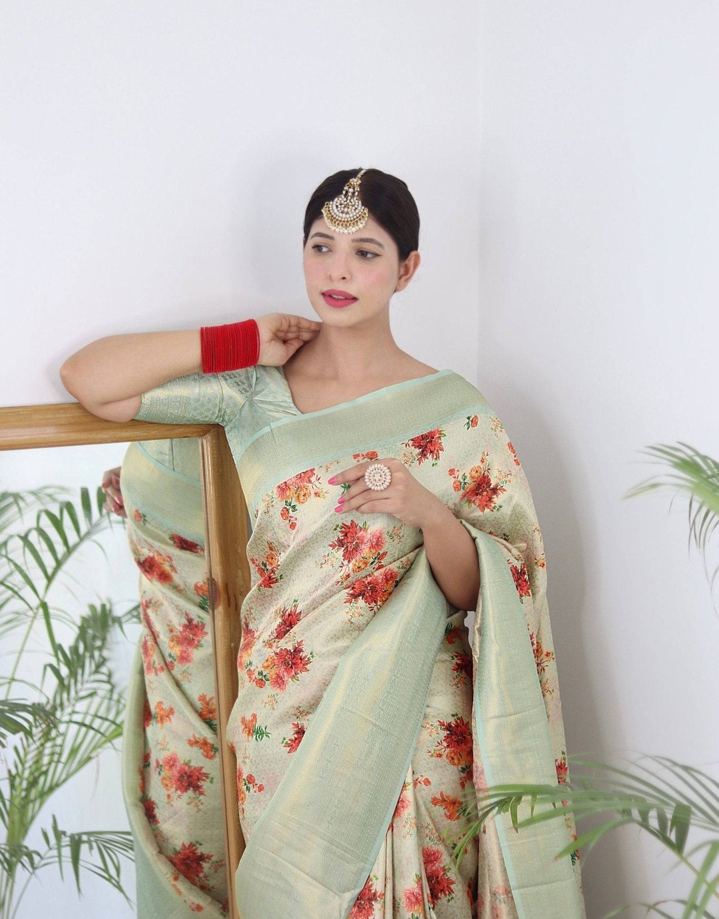 Digitally Printed Kuber Pattu Silk Saree, Exuding Regal Charm With Its Rich Pallu And Intricate Brocade Blouse, Elegantly Adorned With Enchanting Tassels On The Saree's Edge.