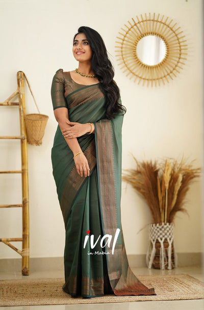 Green Pure Kanjivaram Silk Saree With Moiety Blouse Piece - Almaari Fashion