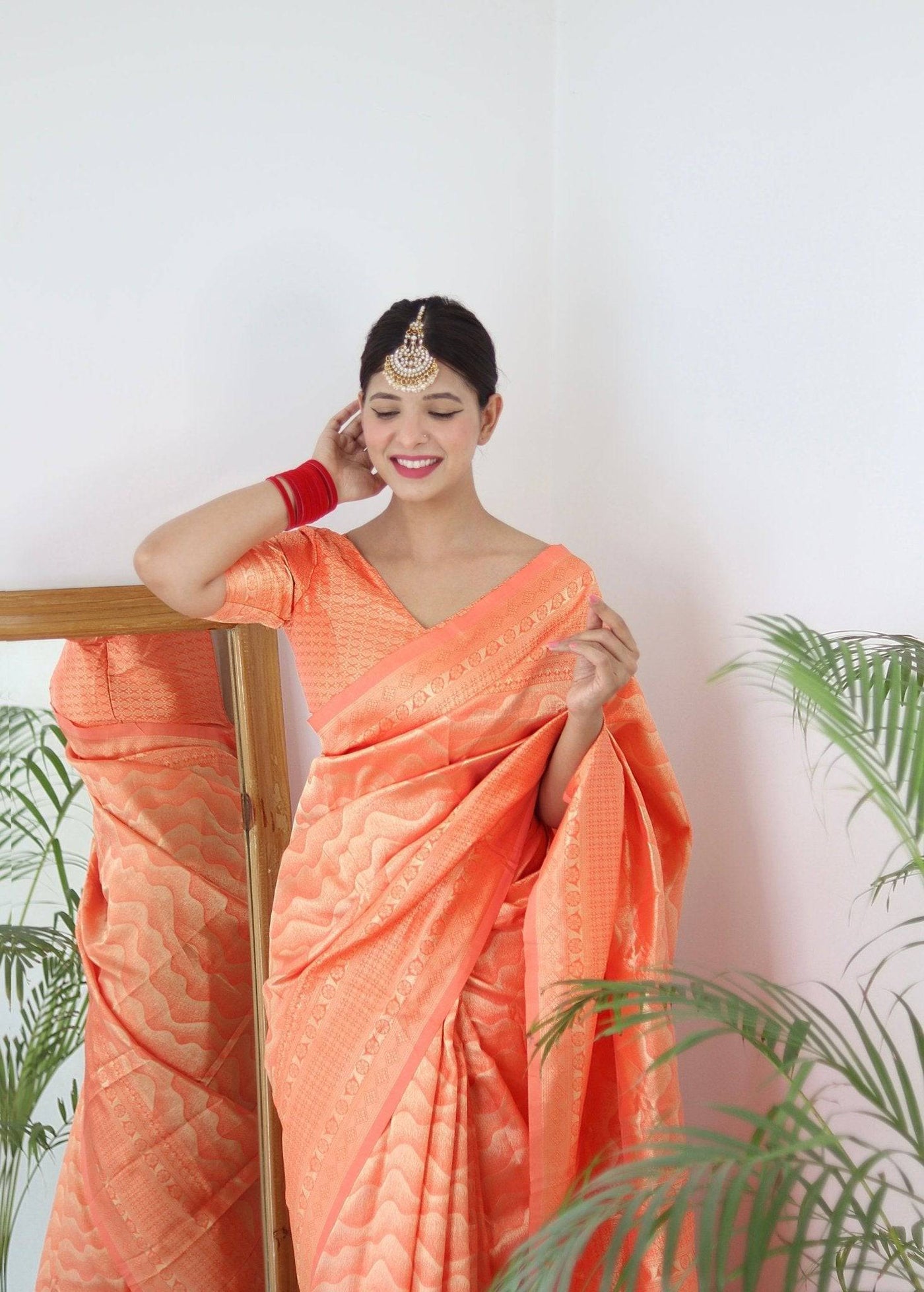 Orange Pure Kanjivaram Silk Saree With Twirling Blouse Piece