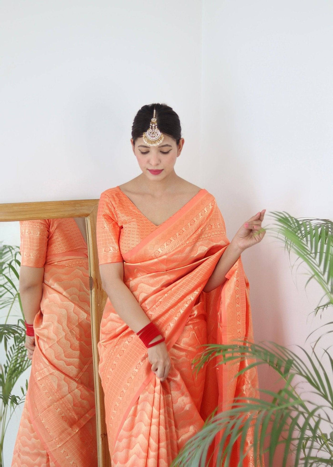 Orange Pure Kanjivaram Silk Saree With Twirling Blouse Piece