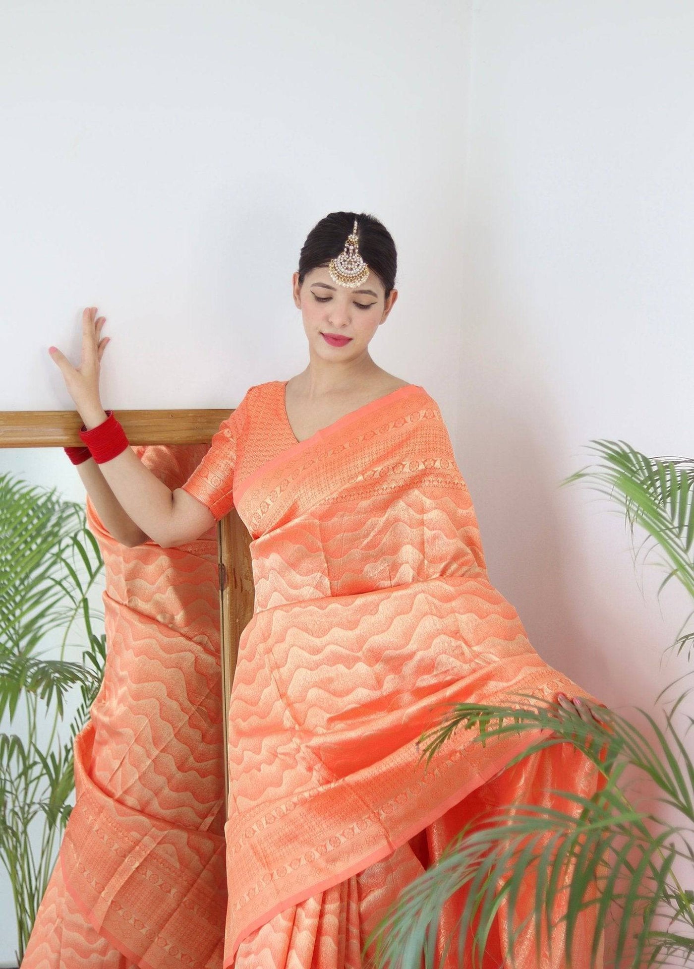 Orange Pure Kanjivaram Silk Saree With Twirling Blouse Piece