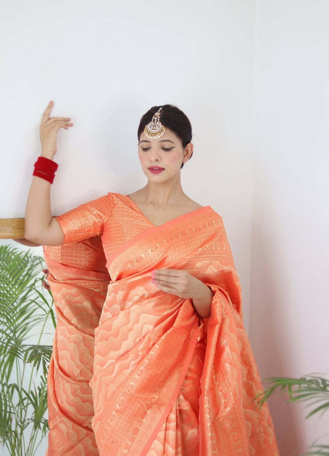 Orange Pure Kanjivaram Silk Saree With Twirling Blouse Piece