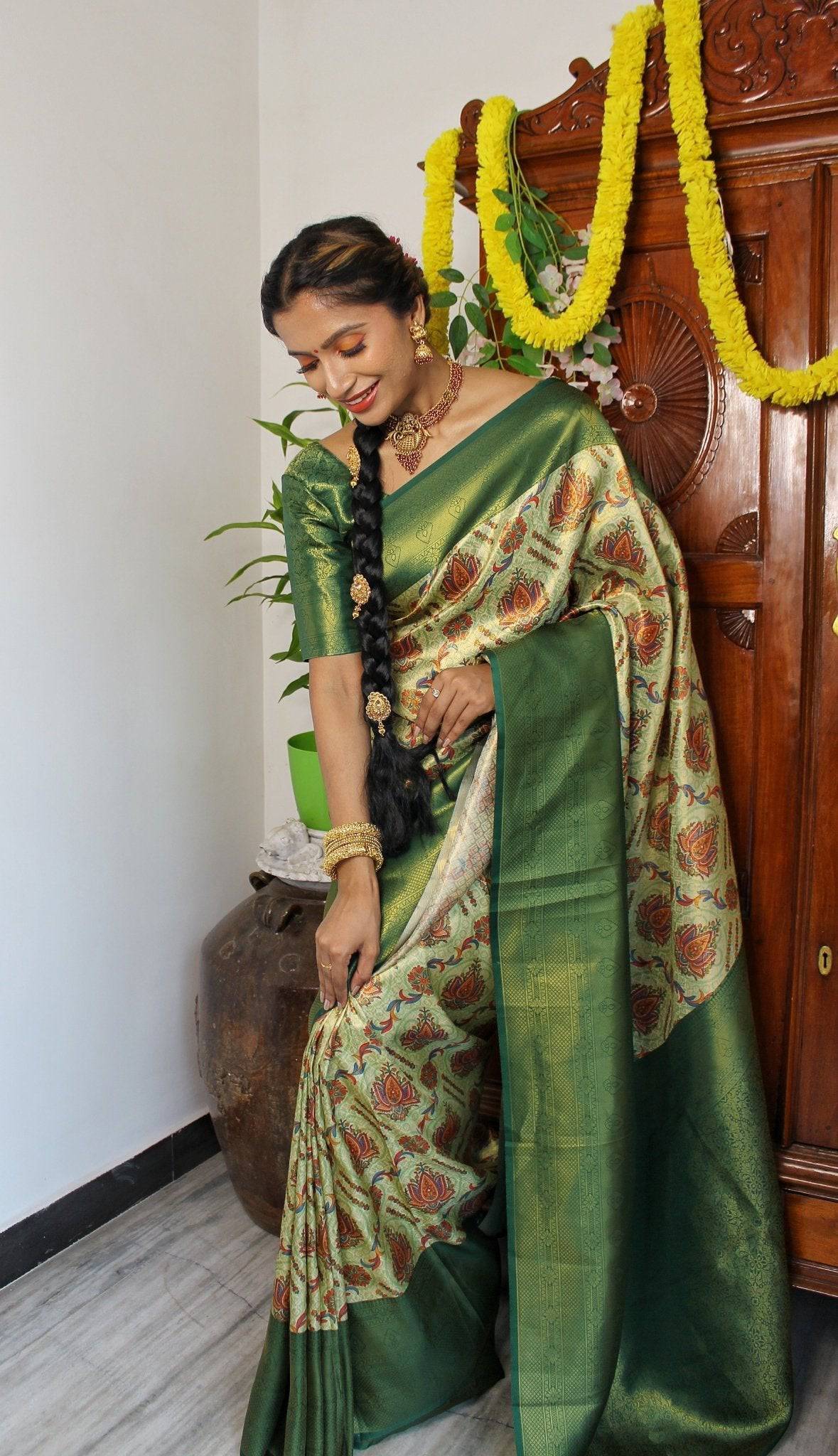 Digitally Printed Kuber Pattu Silk Saree, Exuding Regal Charm With Its Rich Pallu And Intricate Brocade Blouse, Elegantly Adorned With Enchanting Tassels On The Saree's Edge.