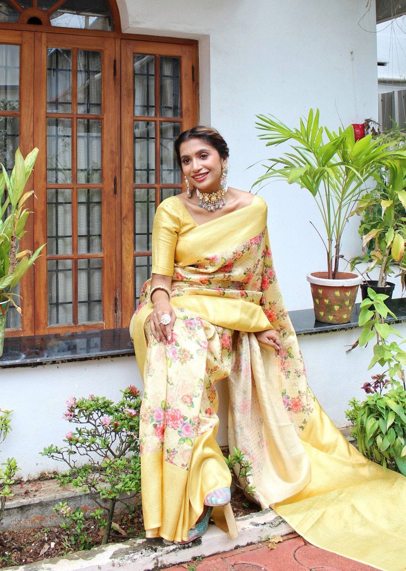 Digitally Printed Kuber Pattu Silk Saree, Exuding Regal Charm With Its Rich Pallu And Intricate Brocade Blouse, Elegantly Adorned With Enchanting Tassels On The Saree's Edge.