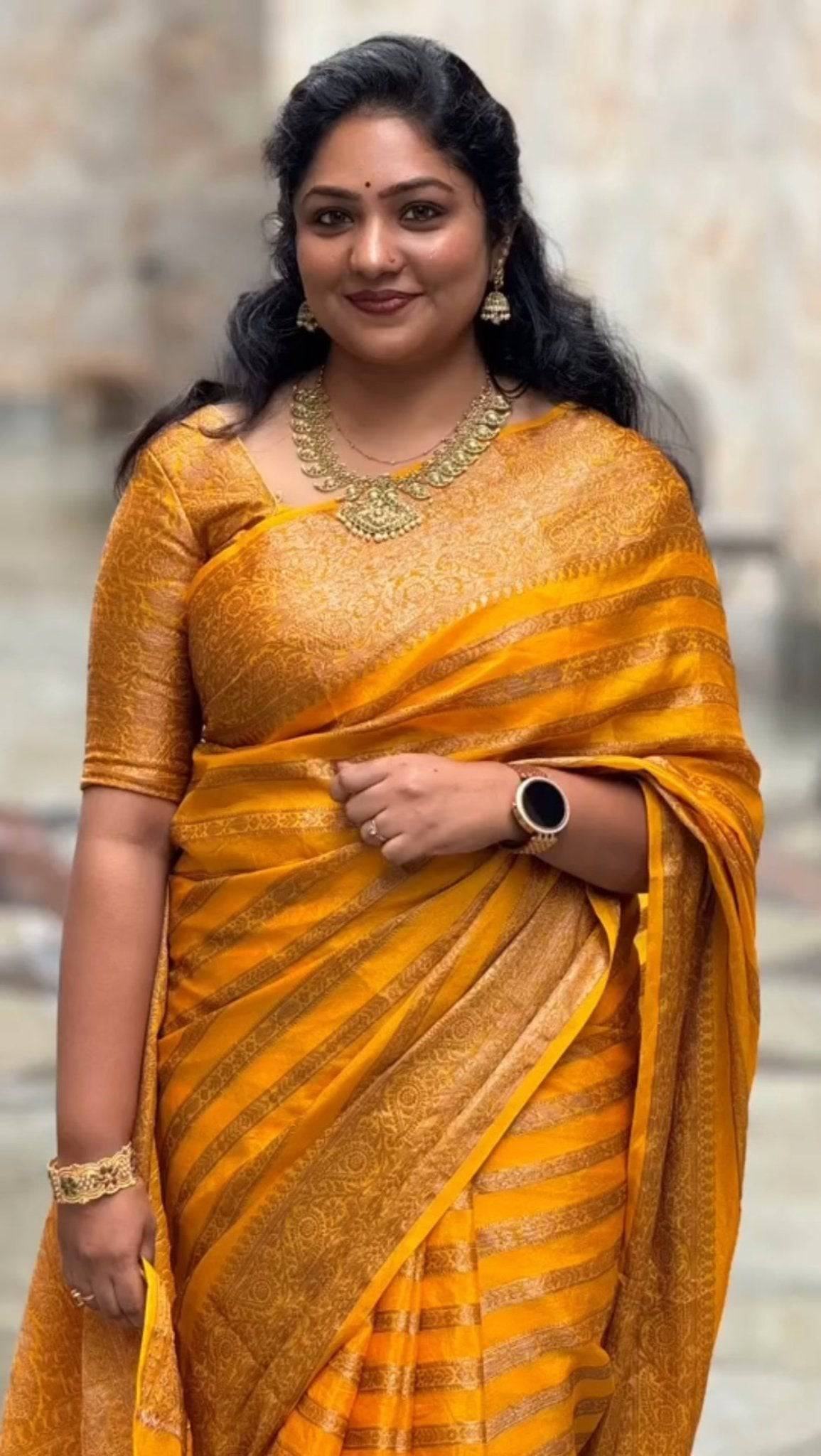 Yellow Pure Georgette Kanjivaram Silk Saree Weaved With Copper Zari Comes With Attached Blouse.