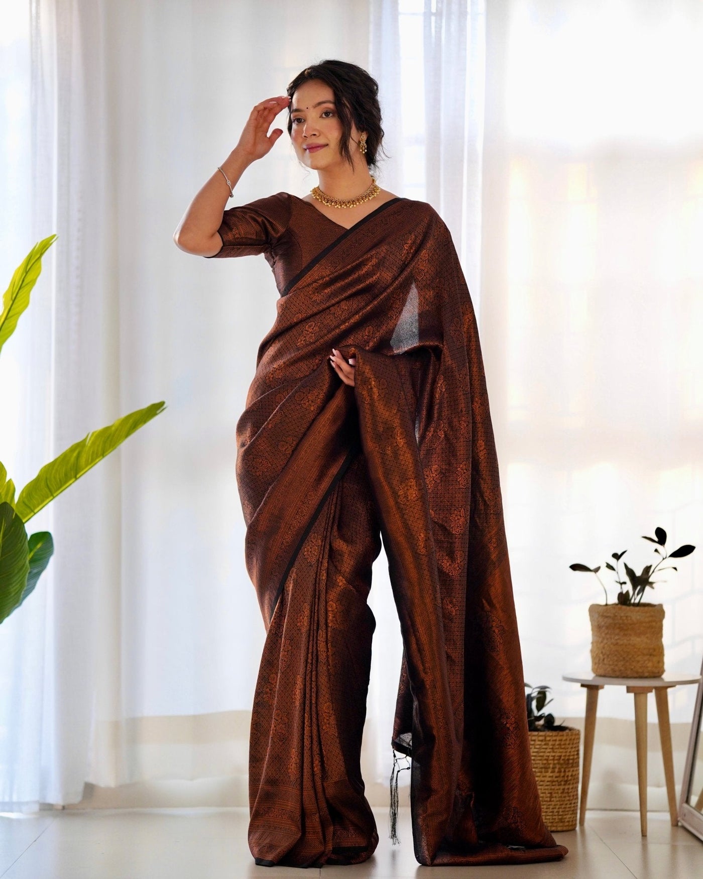 Kuber Pattu Silk Saree, Exuding Regal Charm With Its Rich Pallu And Intricate Brocade Blouse, Elegantly Adorned With Enchanting Tassels On The Saree's Edge. - Almaari Fashion