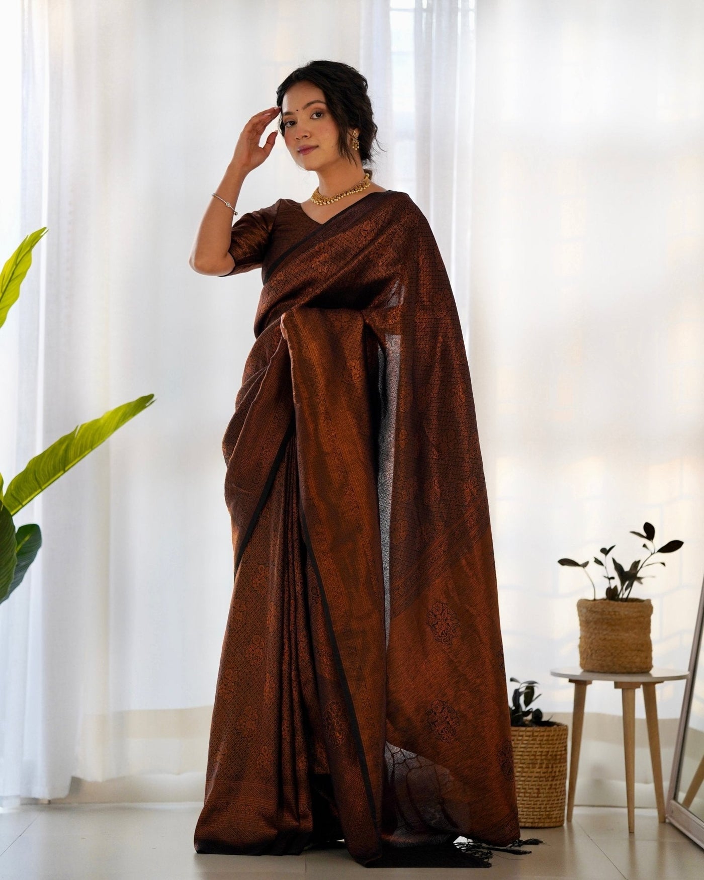 Kuber Pattu Silk Saree, Exuding Regal Charm With Its Rich Pallu And Intricate Brocade Blouse, Elegantly Adorned With Enchanting Tassels On The Saree's Edge. - Almaari Fashion