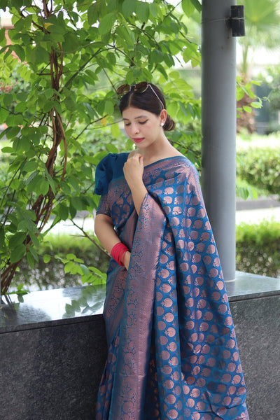 Kuber Pattu Silk Saree, Exuding Regal Charm With Its Rich Pallu And Intricate Brocade Blouse, Elegantly Adorned With Enchanting Tassels On The Saree's Edge. - Almaari Fashion