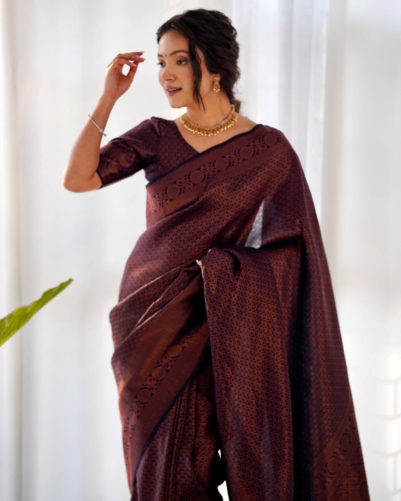 Kuber Pattu Silk Saree, Exuding Regal Charm With Its Rich Pallu And Intricate Brocade Blouse, Elegantly Adorned With Enchanting Tassels On The Saree's Edge. - Almaari Fashion