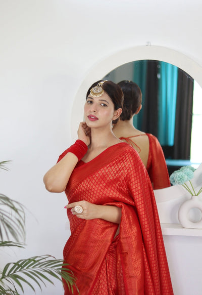 Kuber Pattu Silk Saree, Exuding Regal Charm With Its Rich Pallu And Intricate Brocade Blouse, Elegantly Adorned With Enchanting Tassels On The Saree's Edge. - Almaari Fashion