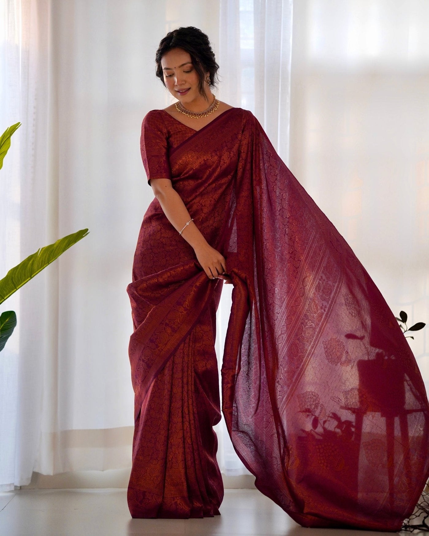 Kuber Pattu Silk Saree, Exuding Regal Charm With Its Rich Pallu And Intricate Brocade Blouse, Elegantly Adorned With Enchanting Tassels On The Saree's Edge. - Almaari Fashion