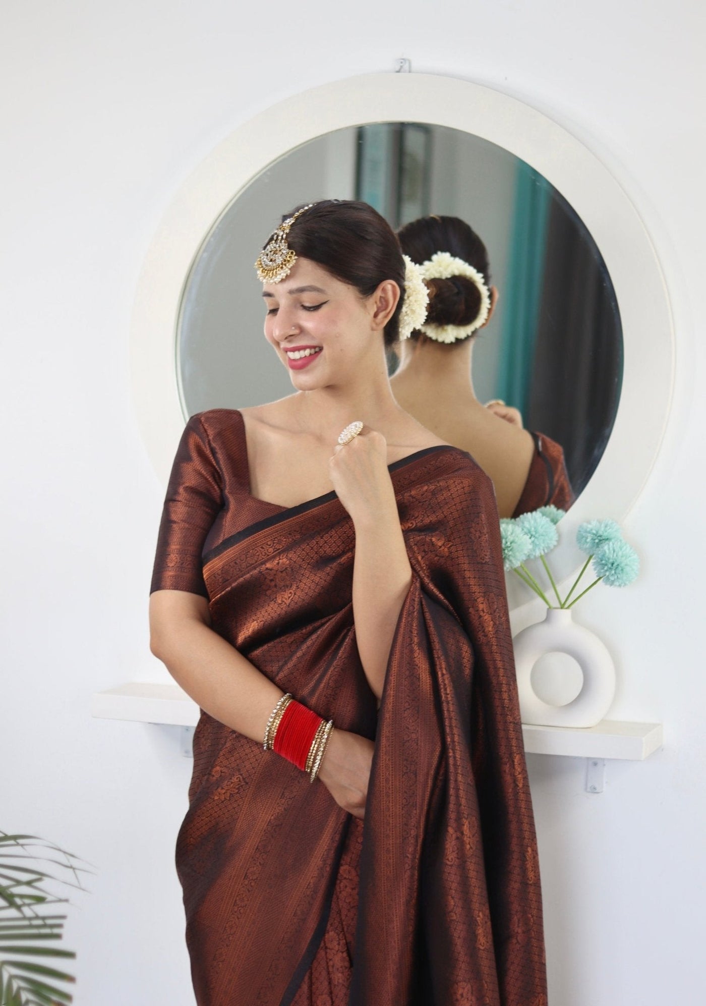 Kuber Pattu Silk Saree, Exuding Regal Charm With Its Rich Pallu And Intricate Brocade Blouse, Elegantly Adorned With Enchanting Tassels On The Saree's Edge. - Almaari Fashion