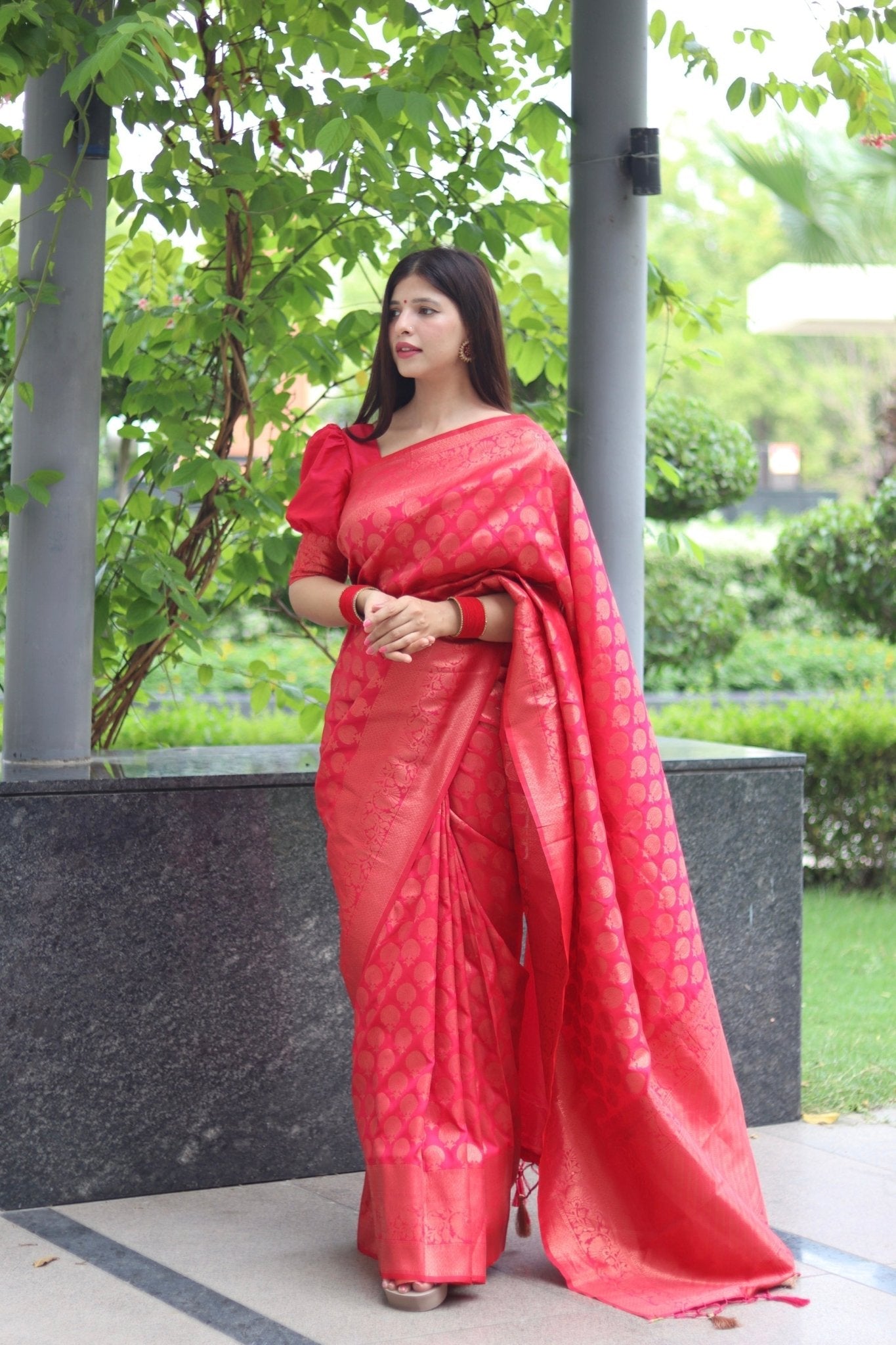 Kuber Pattu Silk Saree, Exuding Regal Charm With Its Rich Pallu And Intricate Brocade Blouse, Elegantly Adorned With Enchanting Tassels On The Saree's Edge. - Almaari Fashion