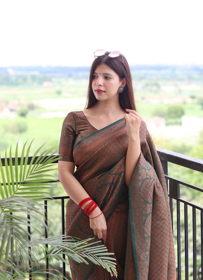 Kuber Pattu Silk Saree, Exuding Regal Charm With Its Rich Pallu And Intricate Brocade Blouse, Elegantly Adorned With Enchanting Tassels On The Saree's Edge. - Almaari Fashion