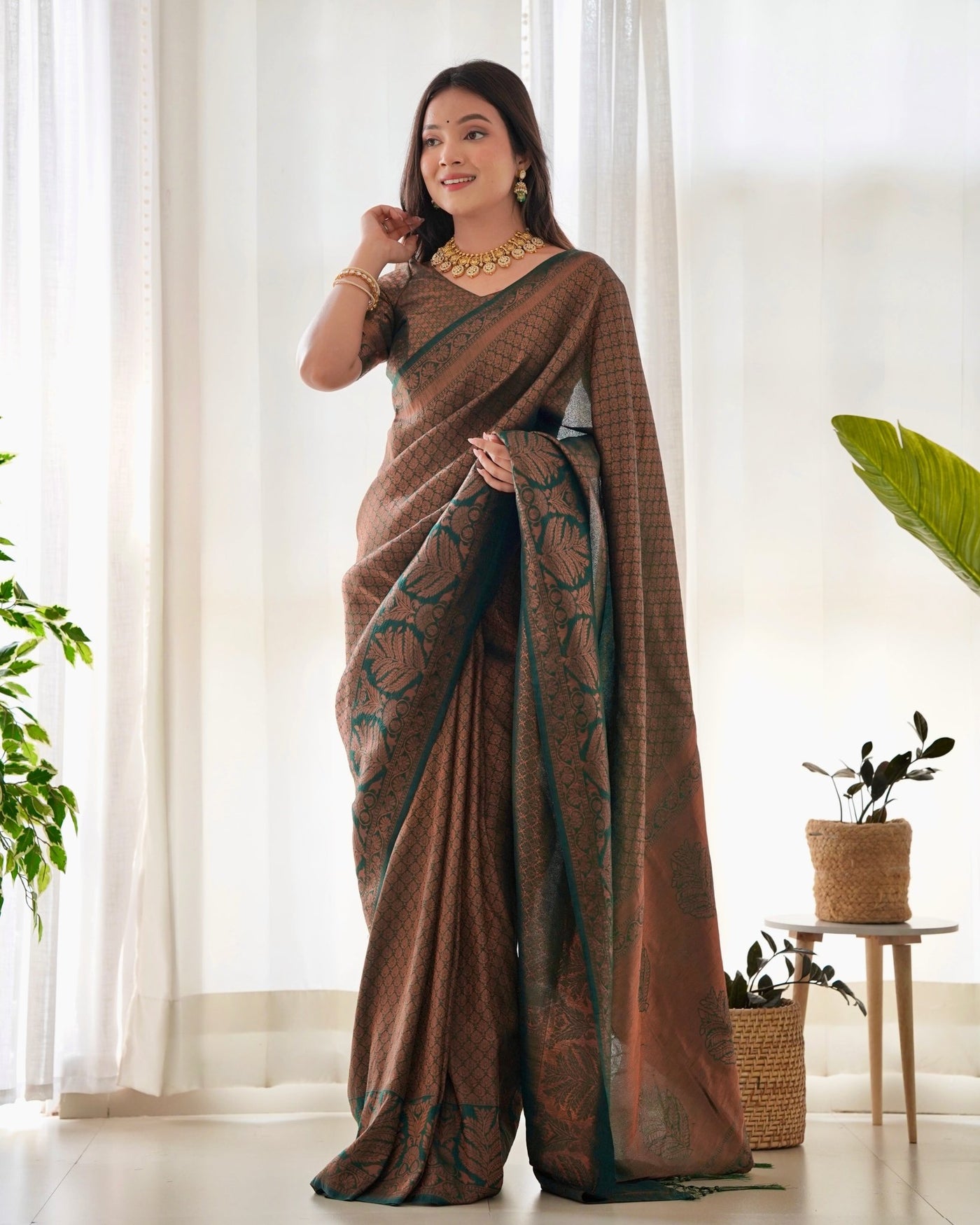 Kuber Pattu Silk Saree, Exuding Regal Charm With Its Rich Pallu And Intricate Brocade Blouse, Elegantly Adorned With Enchanting Tassels On The Saree's Edge. - Almaari Fashion