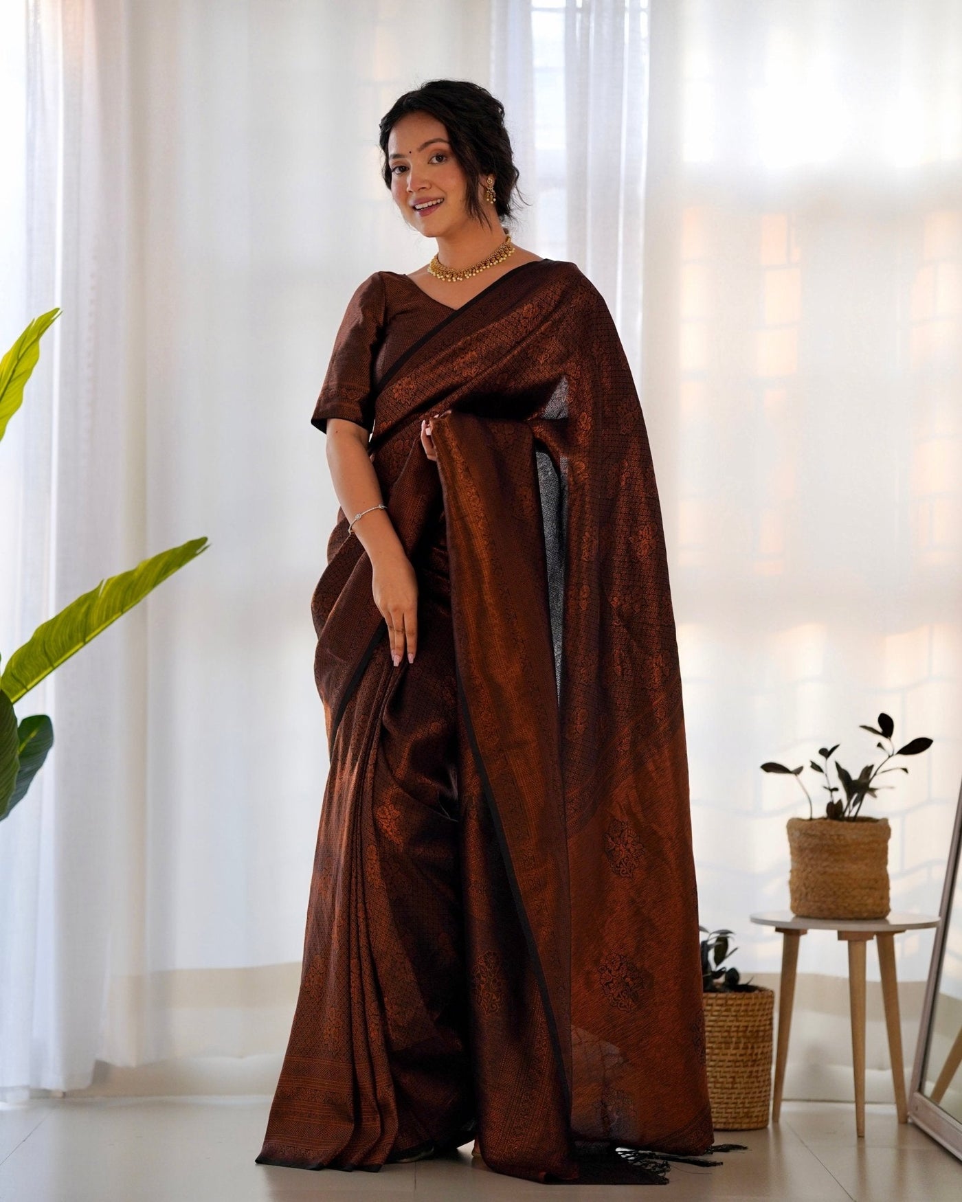 Kuber Pattu Silk Saree, Exuding Regal Charm With Its Rich Pallu And Intricate Brocade Blouse, Elegantly Adorned With Enchanting Tassels On The Saree's Edge. - Almaari Fashion