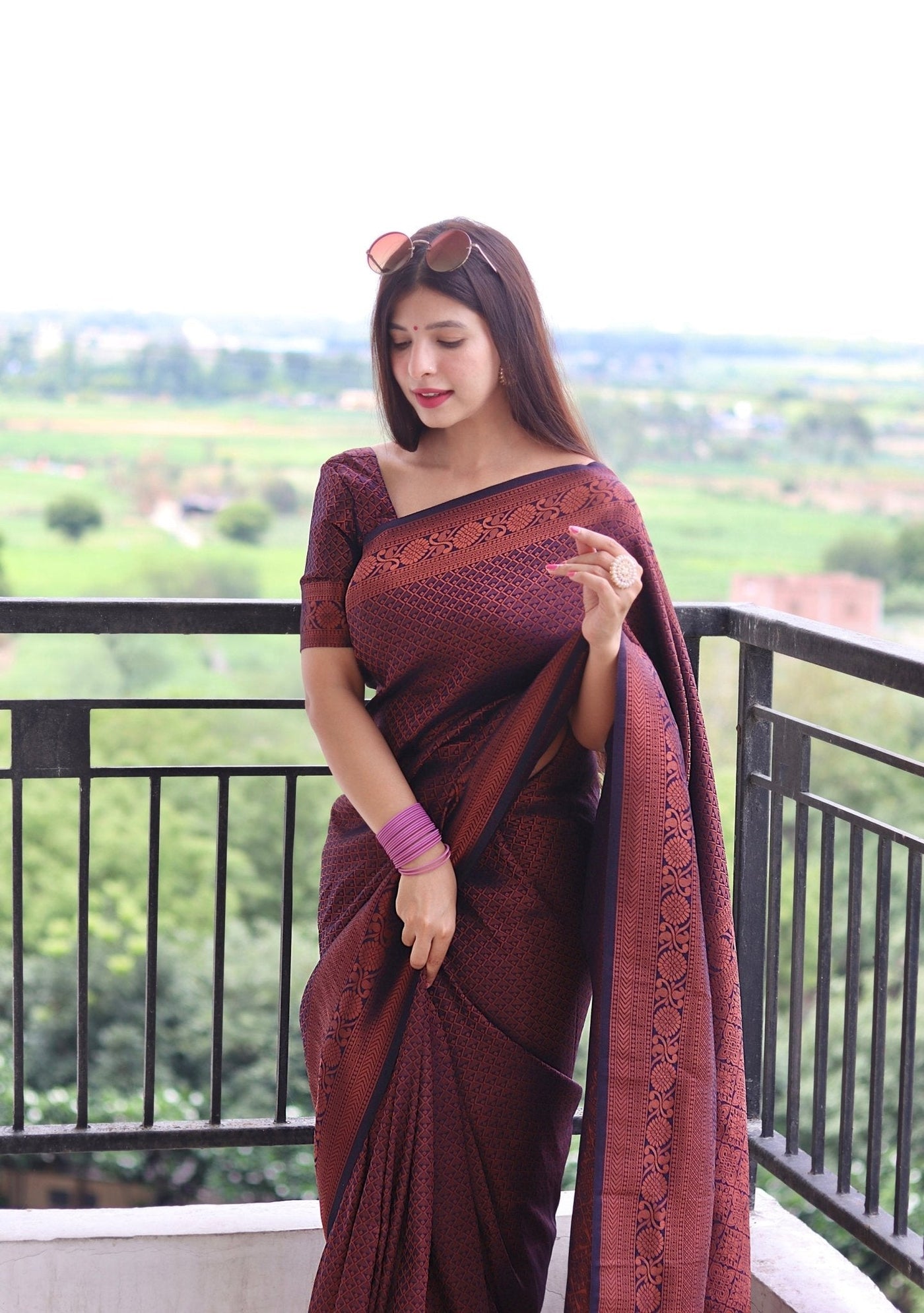 Kuber Pattu Silk Saree, Exuding Regal Charm With Its Rich Pallu And Intricate Brocade Blouse, Elegantly Adorned With Enchanting Tassels On The Saree's Edge. - Almaari Fashion