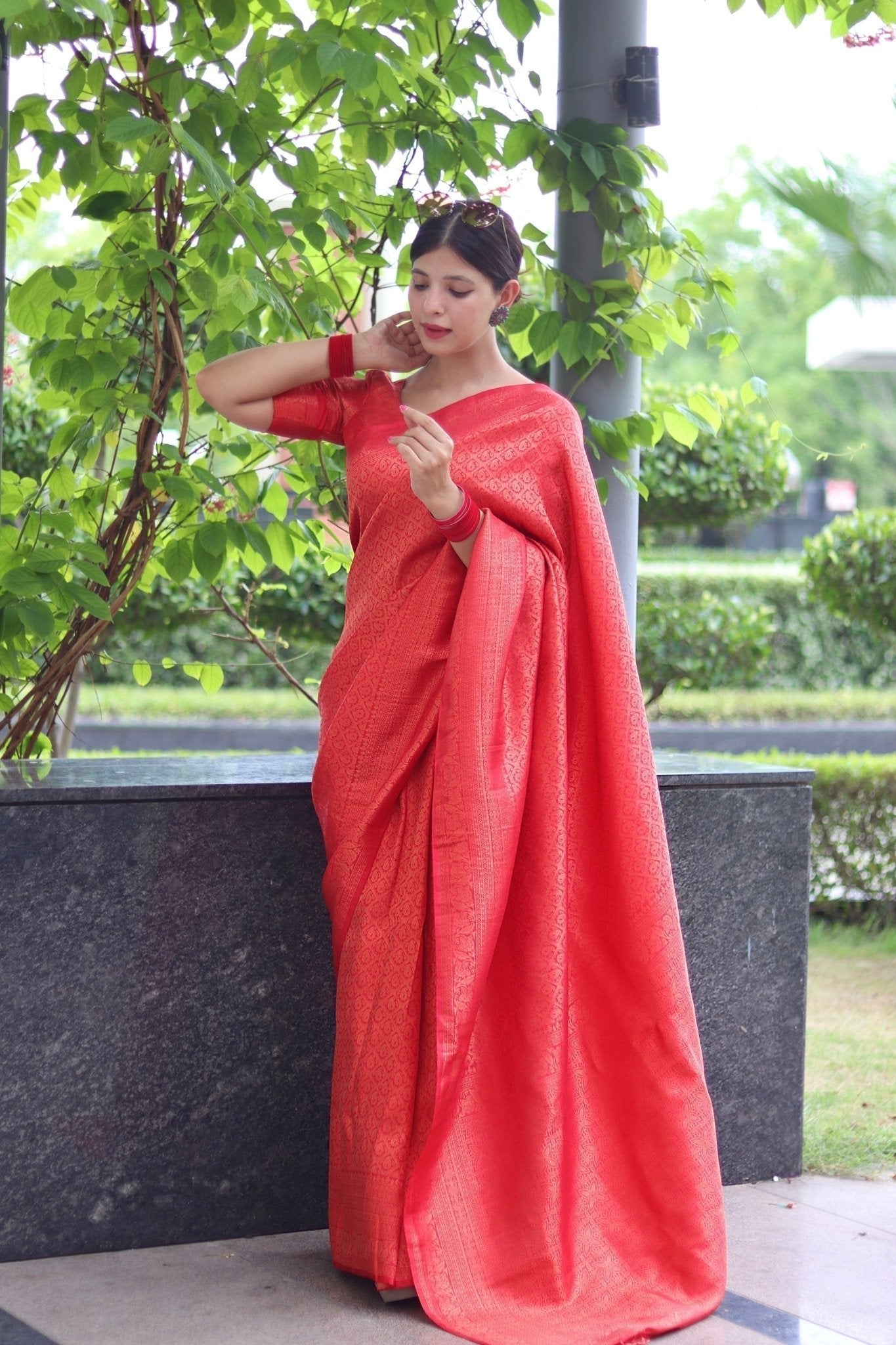 Kuber Pattu Silk Saree, Exuding Regal Charm With Its Rich Pallu And Intricate Brocade Blouse, Elegantly Adorned With Enchanting Tassels On The Saree's Edge. - Almaari Fashion