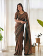 Kuber Pattu Silk Saree, Exuding Regal Charm With Its Rich Pallu And Intricate Brocade Blouse, Elegantly Adorned With Enchanting Tassels On The Saree's Edge.