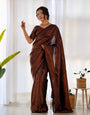 Kuber Pattu Silk Saree, Exuding Regal Charm With Its Rich Pallu And Intricate Brocade Blouse, Elegantly Adorned With Enchanting Tassels On The Saree's Edge.