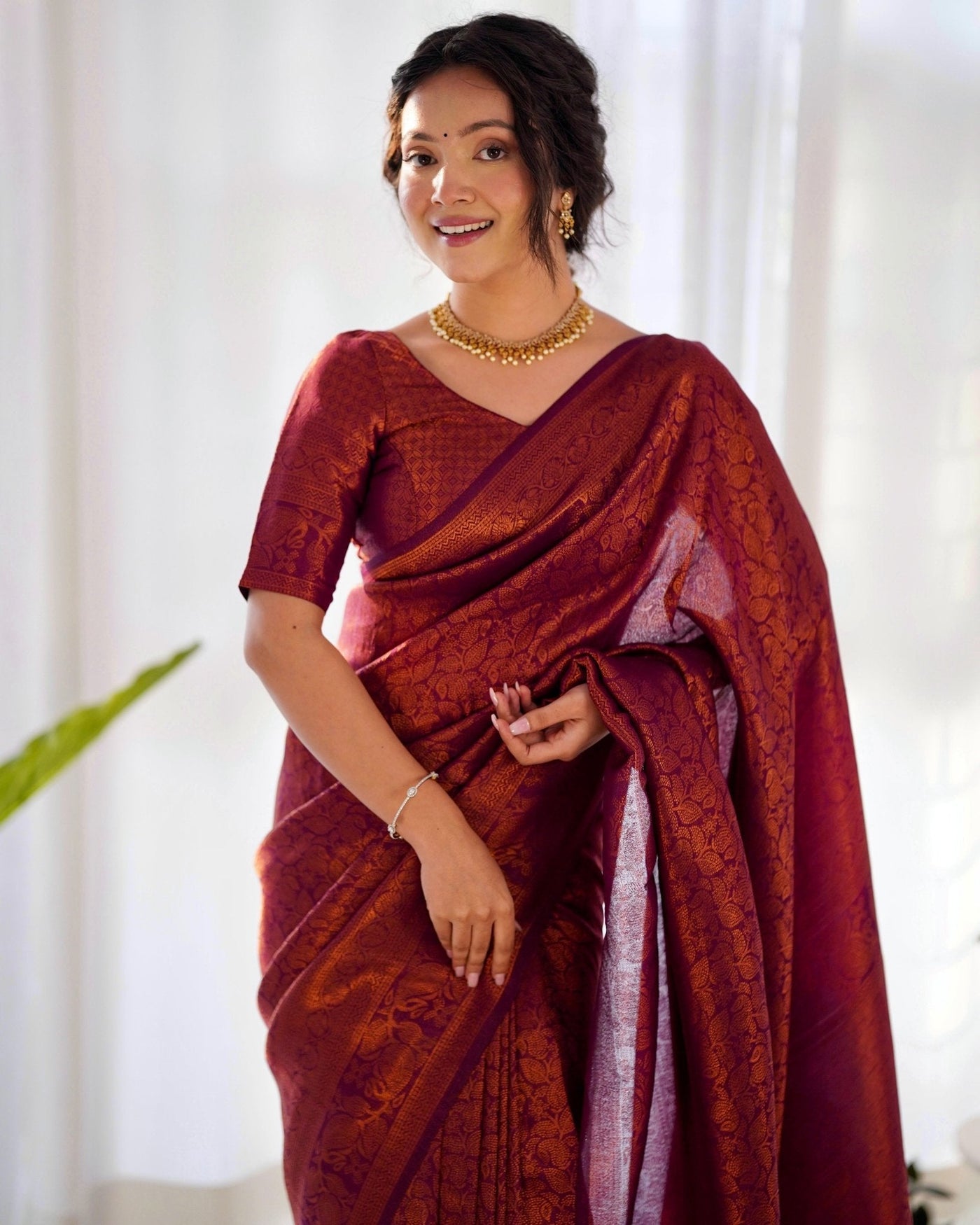 Kuber Pattu Silk Saree, Exuding Regal Charm With Its Rich Pallu And Intricate Brocade Blouse, Elegantly Adorned With Enchanting Tassels On The Saree's Edge. - Almaari Fashion