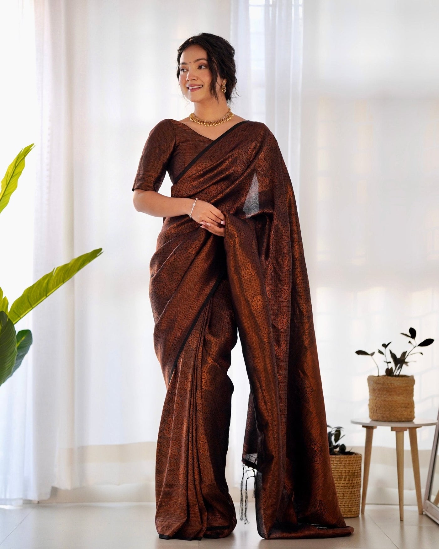 Kuber Pattu Silk Saree, Exuding Regal Charm With Its Rich Pallu And Intricate Brocade Blouse, Elegantly Adorned With Enchanting Tassels On The Saree's Edge. - Almaari Fashion