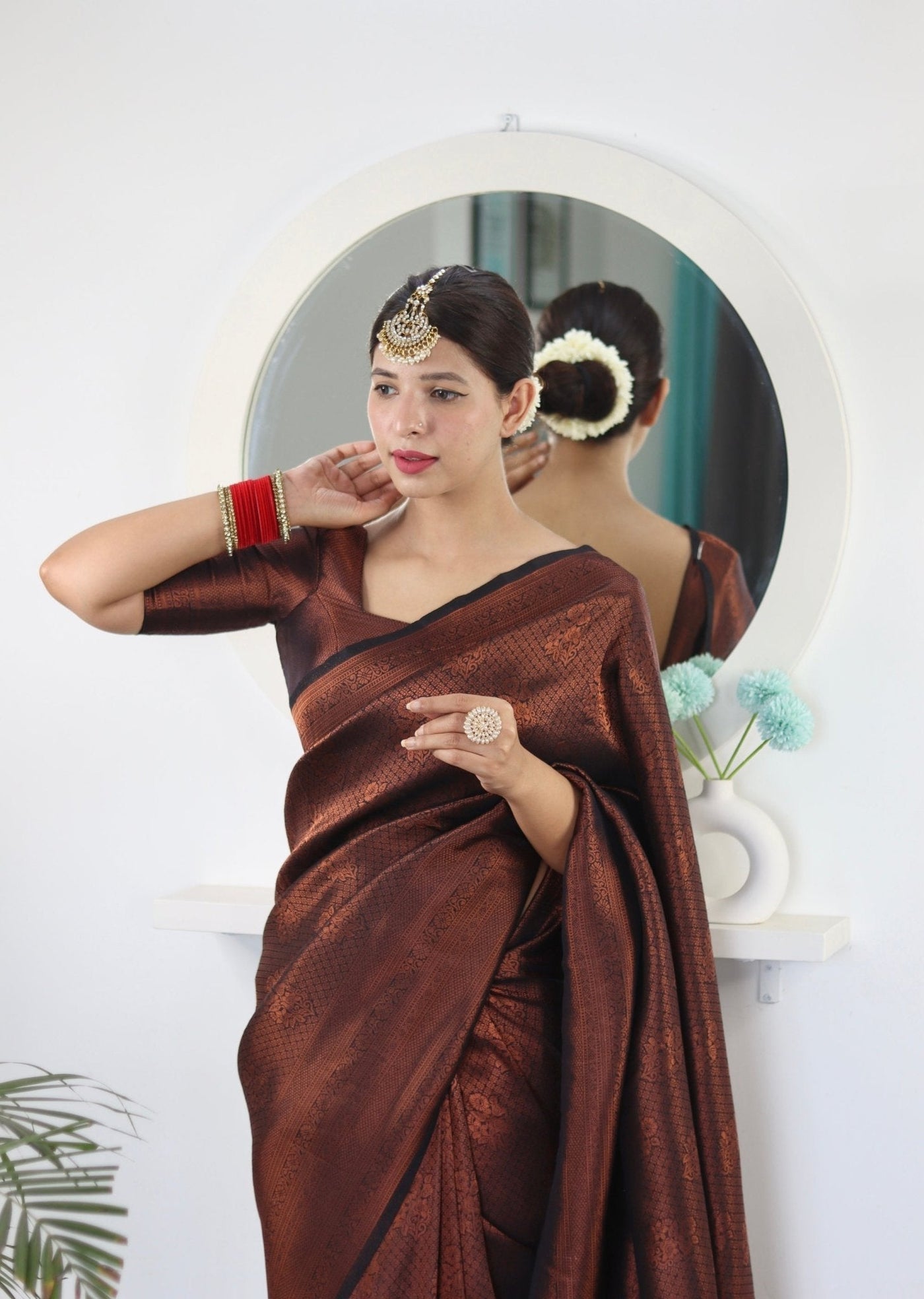 Kuber Pattu Silk Saree, Exuding Regal Charm With Its Rich Pallu And Intricate Brocade Blouse, Elegantly Adorned With Enchanting Tassels On The Saree's Edge. - Almaari Fashion