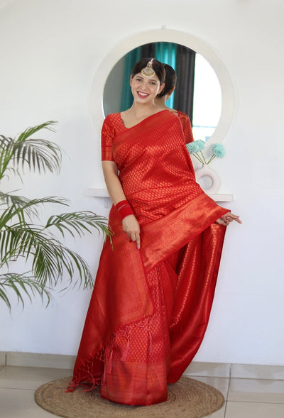 Kuber Pattu Silk Saree, Exuding Regal Charm With Its Rich Pallu And Intricate Brocade Blouse, Elegantly Adorned With Enchanting Tassels On The Saree's Edge. - Almaari Fashion