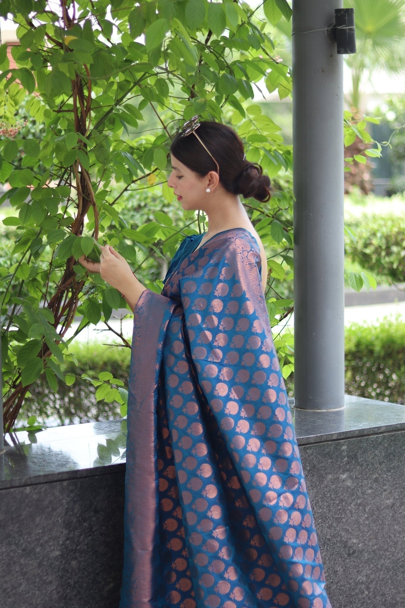 Kuber Pattu Silk Saree, Exuding Regal Charm With Its Rich Pallu And Intricate Brocade Blouse, Elegantly Adorned With Enchanting Tassels On The Saree's Edge. - Almaari Fashion