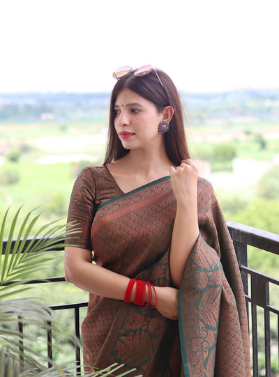 Kuber Pattu Silk Saree, Exuding Regal Charm With Its Rich Pallu And Intricate Brocade Blouse, Elegantly Adorned With Enchanting Tassels On The Saree's Edge. - Almaari Fashion