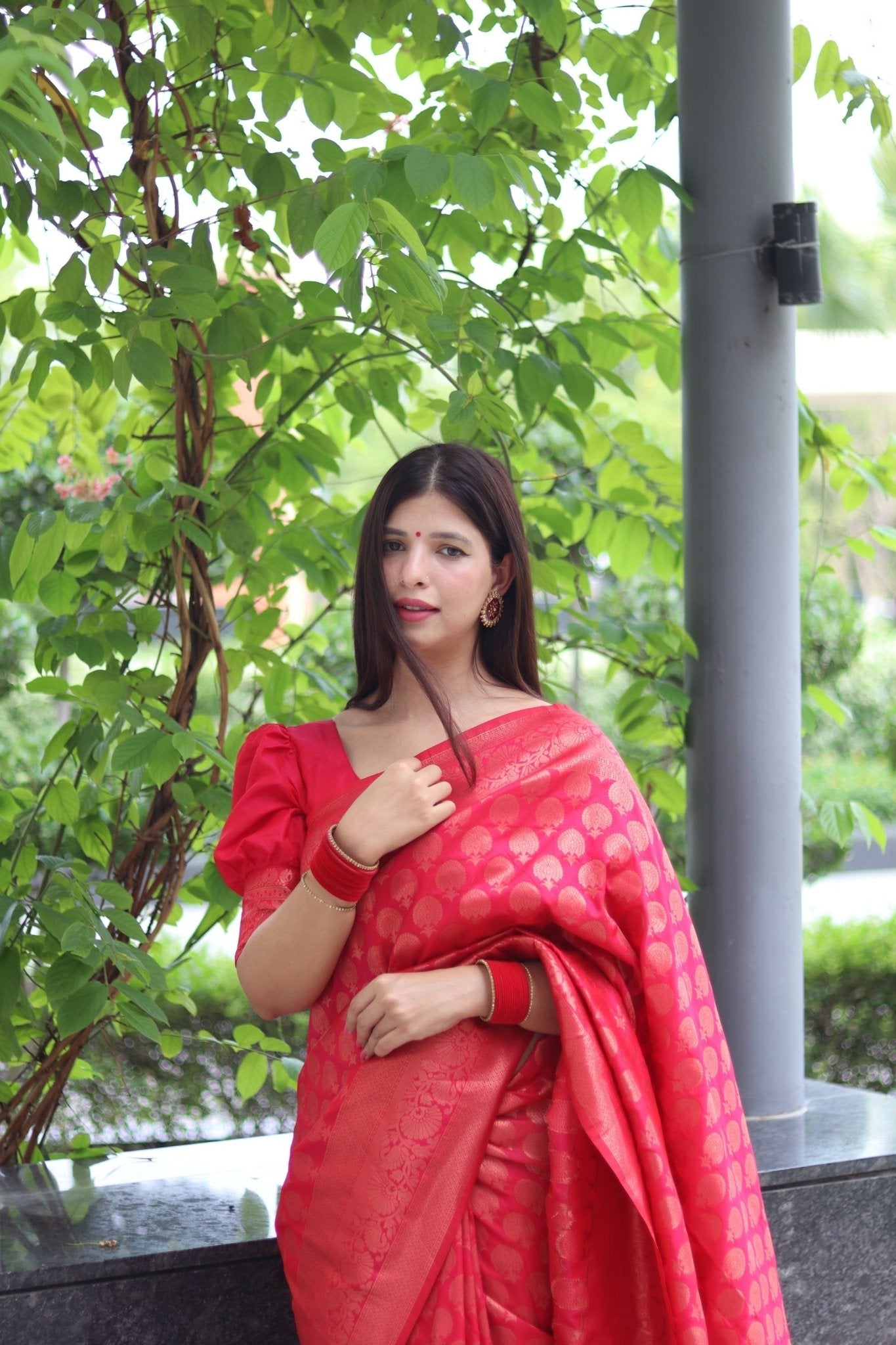 Kuber Pattu Silk Saree, Exuding Regal Charm With Its Rich Pallu And Intricate Brocade Blouse, Elegantly Adorned With Enchanting Tassels On The Saree's Edge. - Almaari Fashion