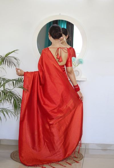 Kuber Pattu Silk Saree, Exuding Regal Charm With Its Rich Pallu And Intricate Brocade Blouse, Elegantly Adorned With Enchanting Tassels On The Saree's Edge. - Almaari Fashion