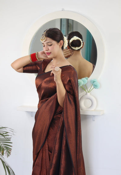 Kuber Pattu Silk Saree, Exuding Regal Charm With Its Rich Pallu And Intricate Brocade Blouse, Elegantly Adorned With Enchanting Tassels On The Saree's Edge. - Almaari Fashion