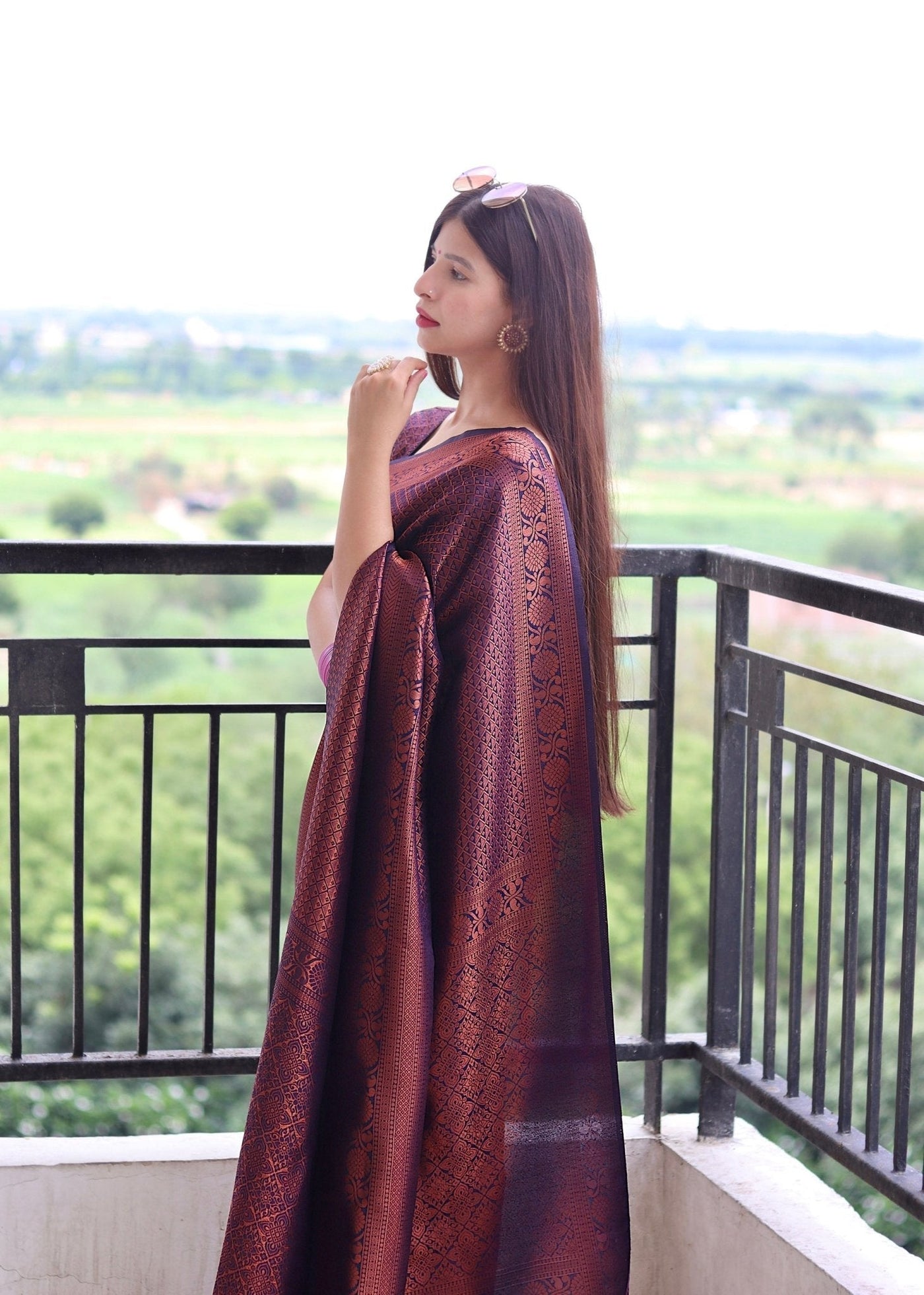 Kuber Pattu Silk Saree, Exuding Regal Charm With Its Rich Pallu And Intricate Brocade Blouse, Elegantly Adorned With Enchanting Tassels On The Saree's Edge. - Almaari Fashion